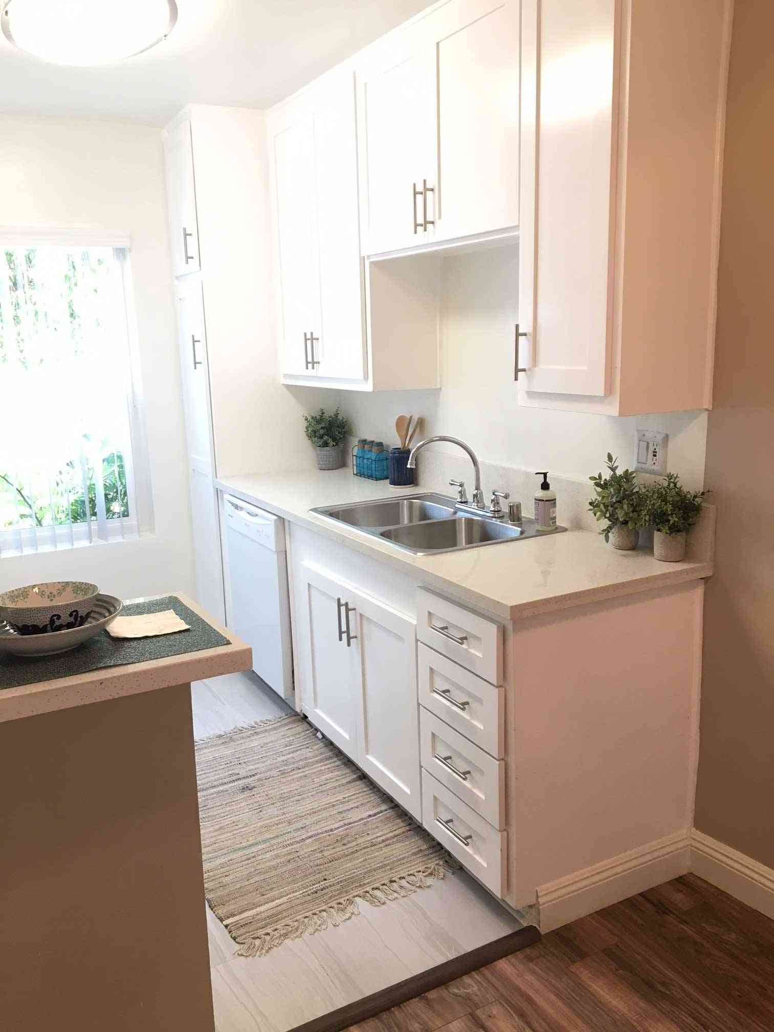 modern galley kitchen with quartz countertops