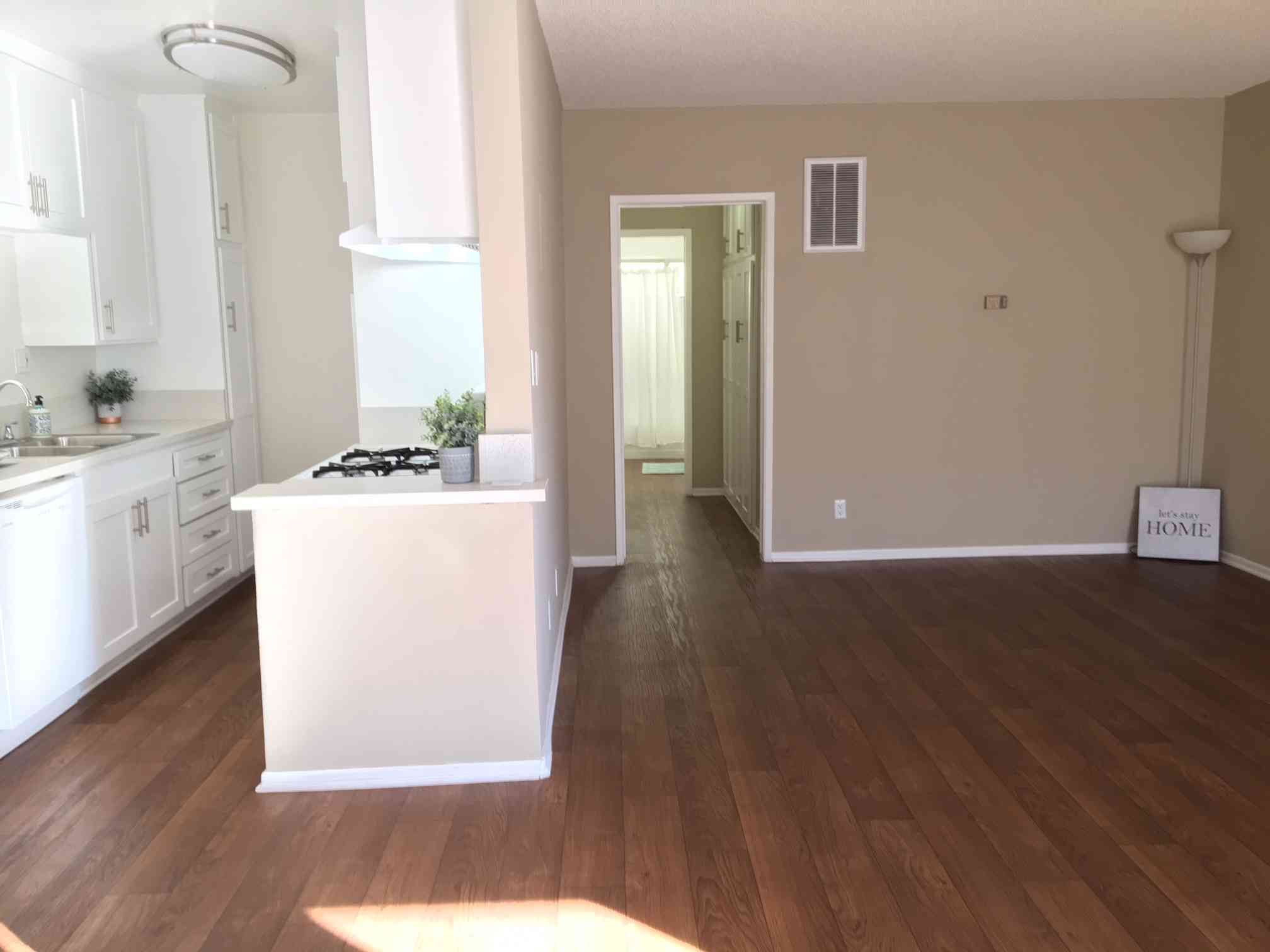 open floor plan with hardwood style flooring