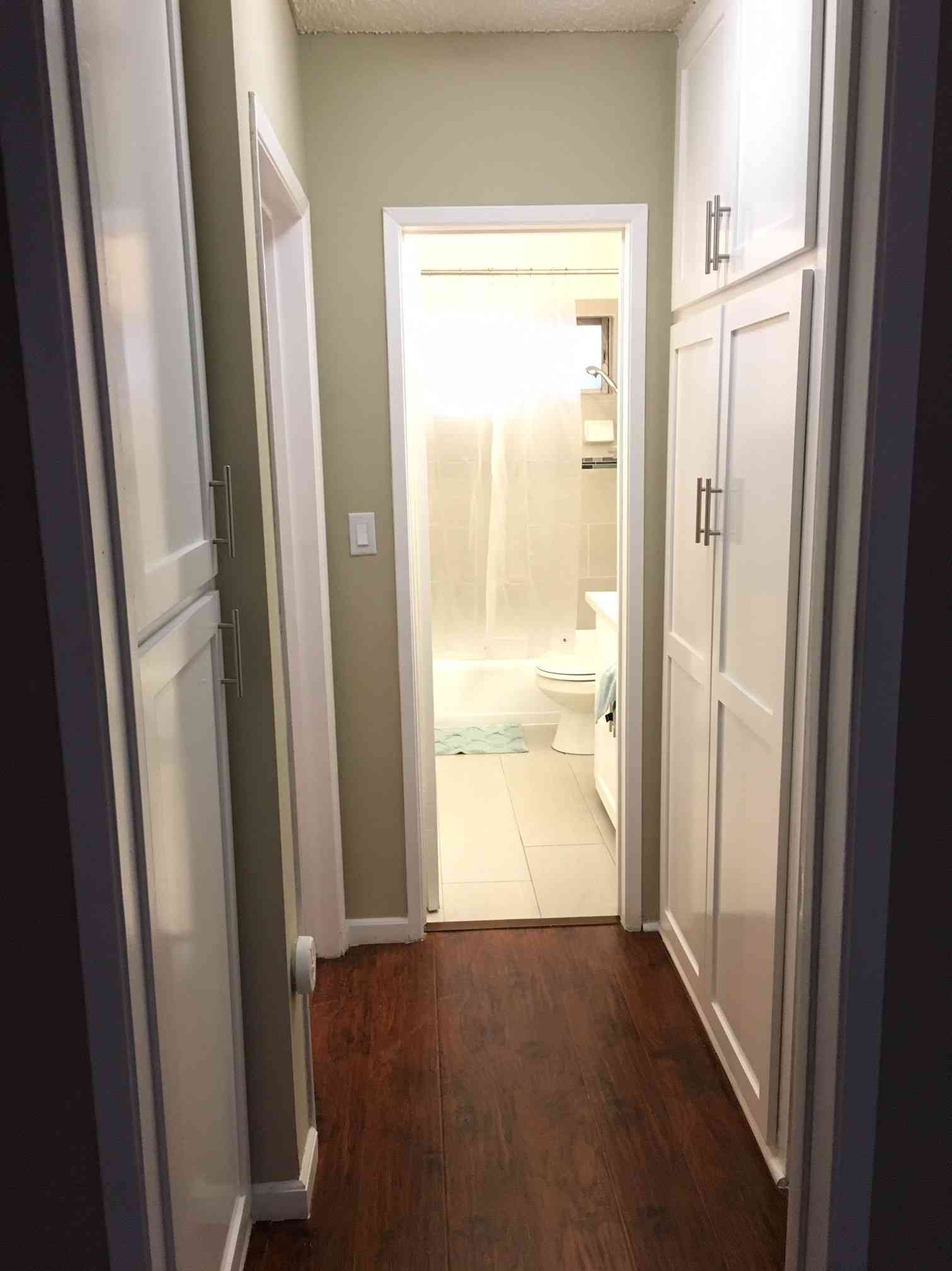 hallway linen closet and built in cabinets
